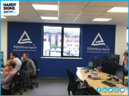 TUV-Rheinland-Hardy-Signs-Ltd-Wallpaper-Graphics-Office-Signage-2019-8-01
