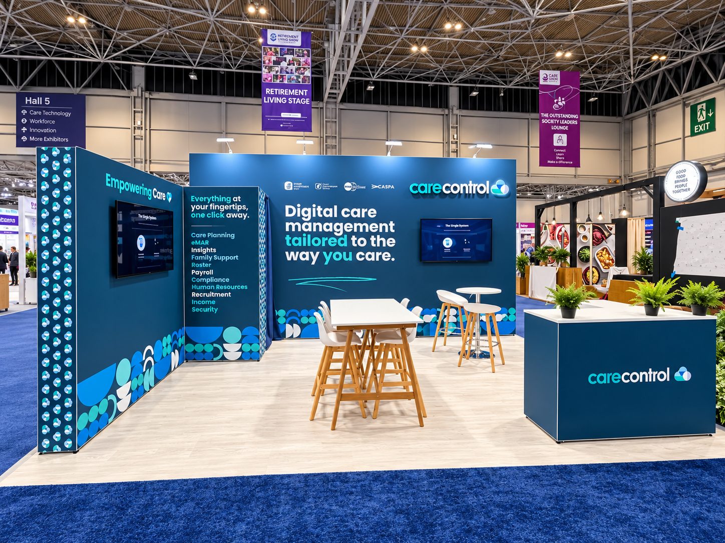 CareControl trade show booth with blue branding, seating, and digital displays promoting digital care management tailored to care providers.